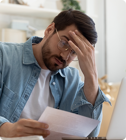 A borrower stressed over his debt after borrowing from an illegitimate money lender
